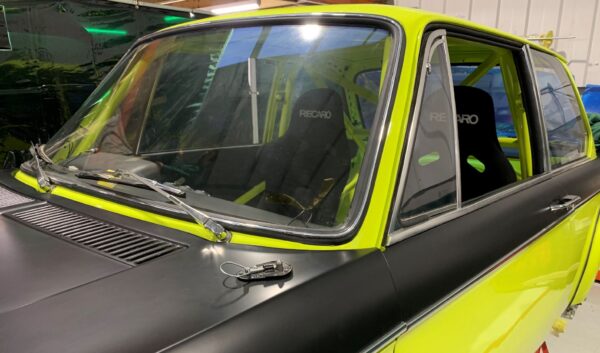 Laminated, heated windscreen
